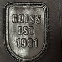 和猪队友一人一件的 guess 的工装羽绒服过冬很不错