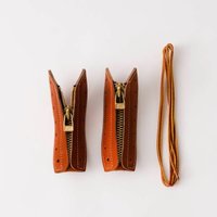 从系带到拉链的跨越：RED WING 红翼 推出 Boots Leather Zipper Unit 工装靴小配件