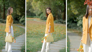 佟丽娅身穿简约黄色西装搭配浅杏色针织套装，干练大气，尽显优雅姿态，清爽的春日气息，惬意舒适