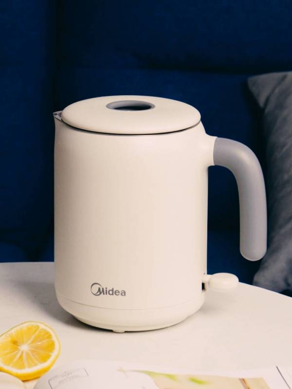 midea美的电水壶06l烧水壶办公室旅行便携带迷你小容量拔盖设计热水壶