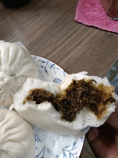 口味清淡偏甜的梅菜肉包，方便的早餐。