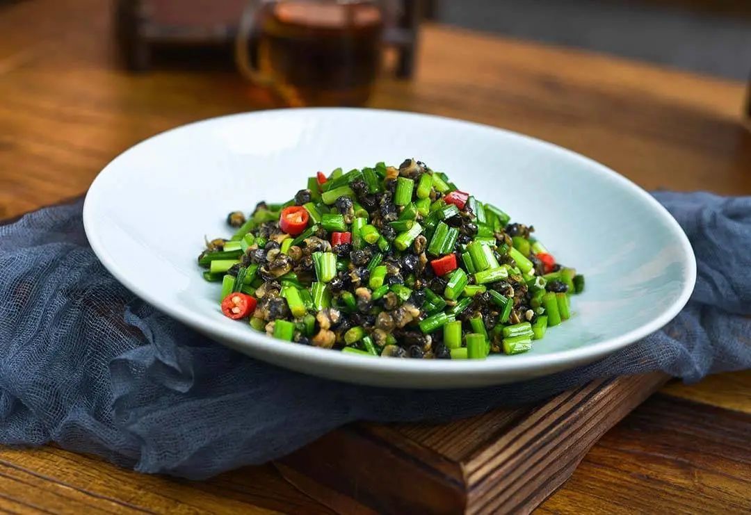 清明前将青韭与螺蛳同炒,鲜上加鲜.更是春日江南一绝 08图源网络