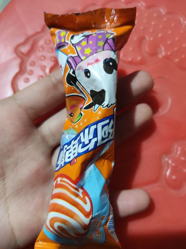 橙子味的牛奶棒棒糖