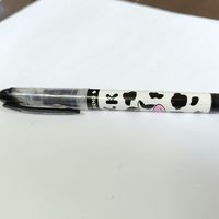 实惠又耐用的晨光奶牛钢笔。