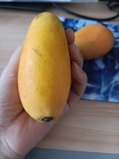 这个芒果又香又甜呀！