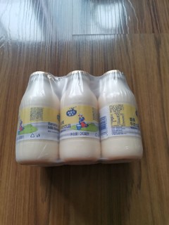 子母奶弗里生乳牛，圆瓶装的牛奶还得选它