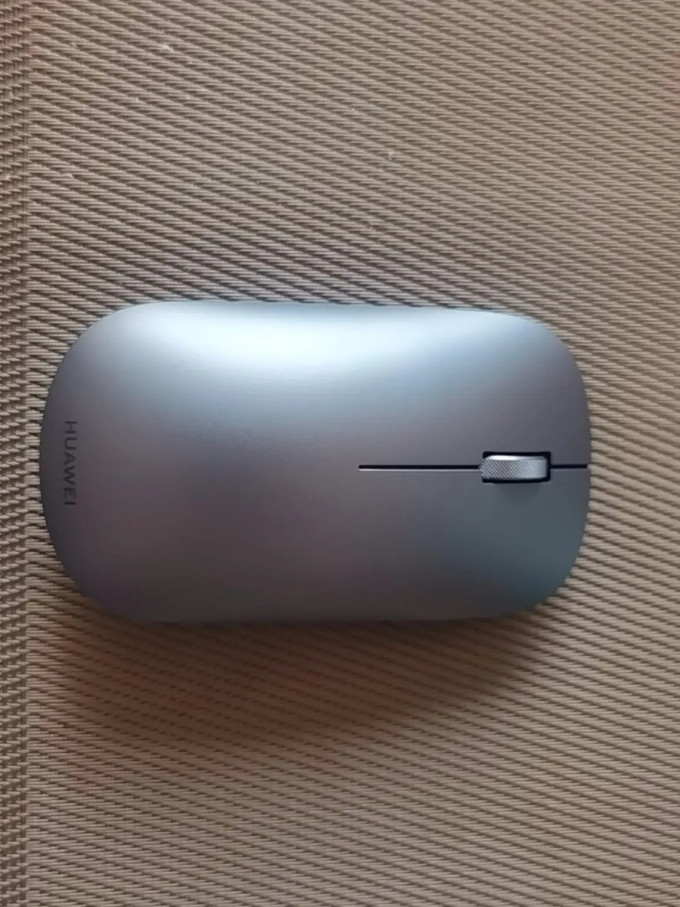 华为cd23-c鼠标怎么样 果真连接华为笔记本很速度,放在旁边直接点击