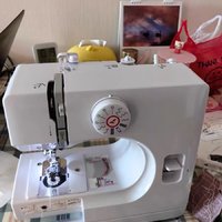 缝补衣物的全自动缝纫机