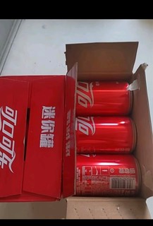 可口可乐（Coca-Cola）汽水 碳酸饮料 200ml*12罐  迷你摩登罐 新老包装随机发货